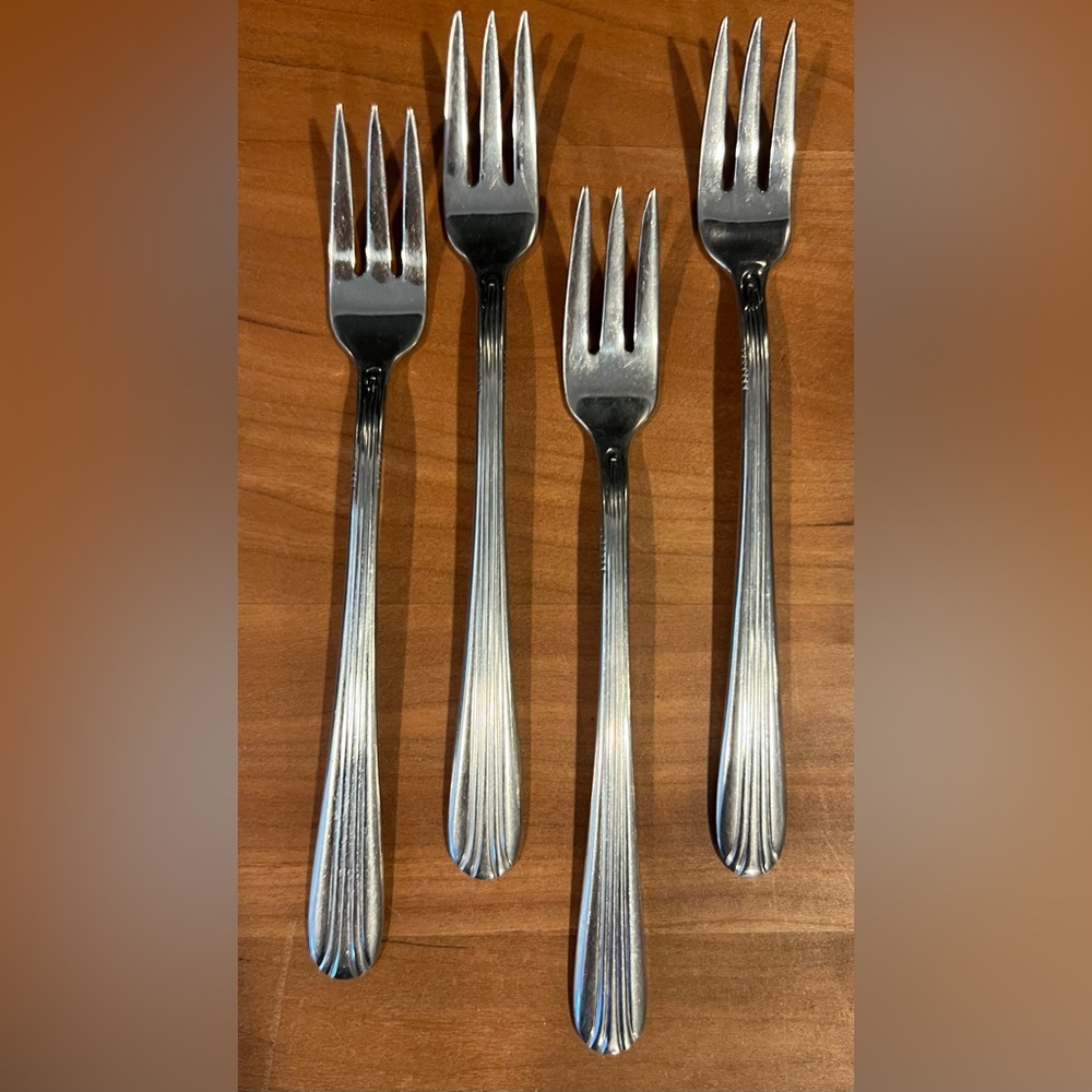 Set of four (4) three tine seafood forks, stainless